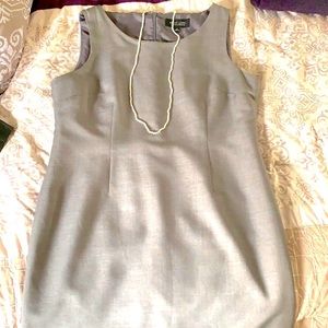 Charcoal grey sleeveless Evan Piccone dress.